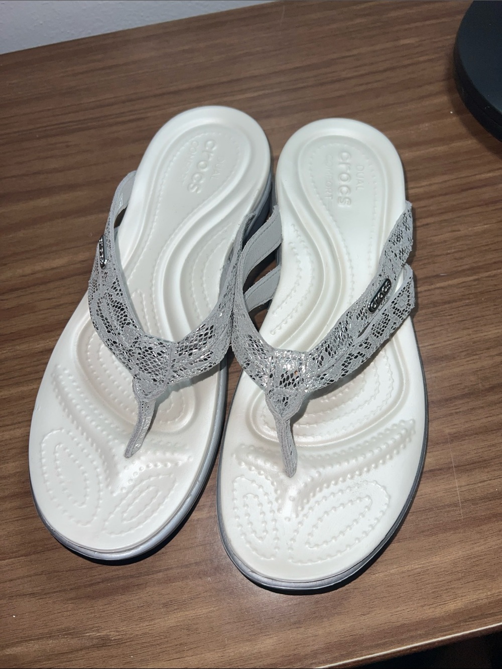 CROCS Women’s White and Silver Flip Sandals